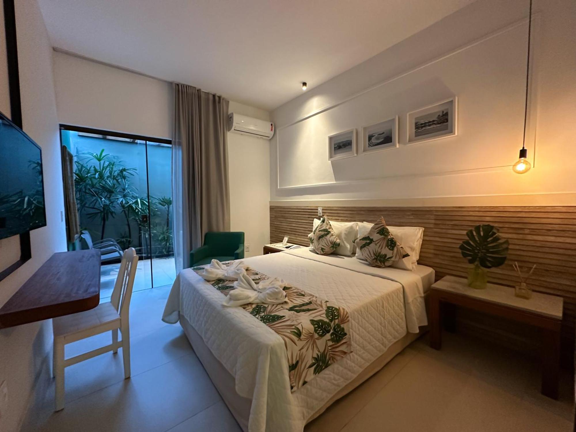Passagem Concept Hotel E Spa Κάμπο Φρίο Εξωτερικό φωτογραφία A room at the hotel