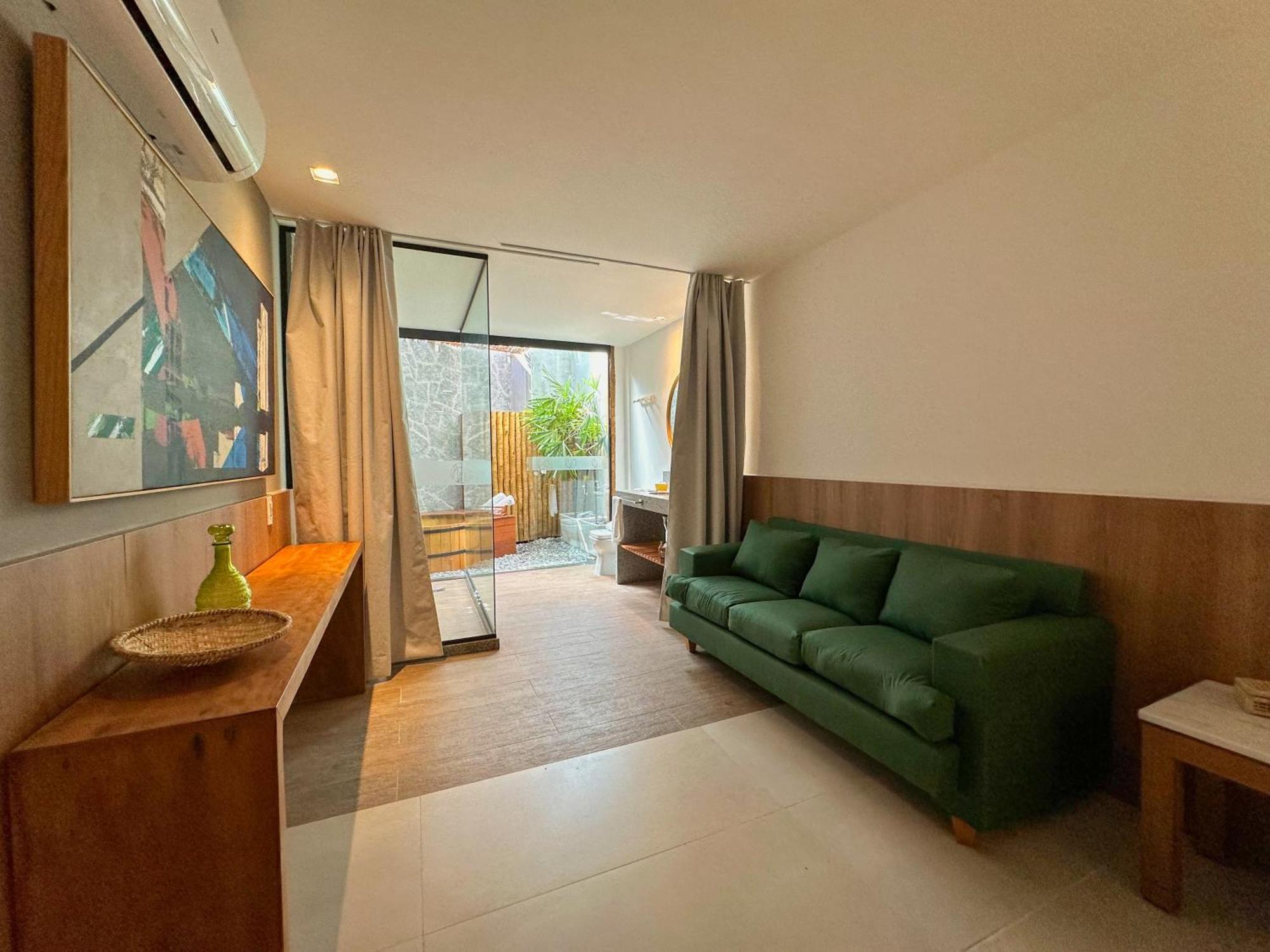 Passagem Concept Hotel E Spa Κάμπο Φρίο Εξωτερικό φωτογραφία A living room in a micro apartment in Beijing, China